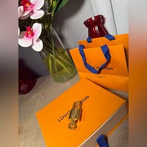 Authentic Louis Vuitton brass padlock and key set #342 vintage before 2009